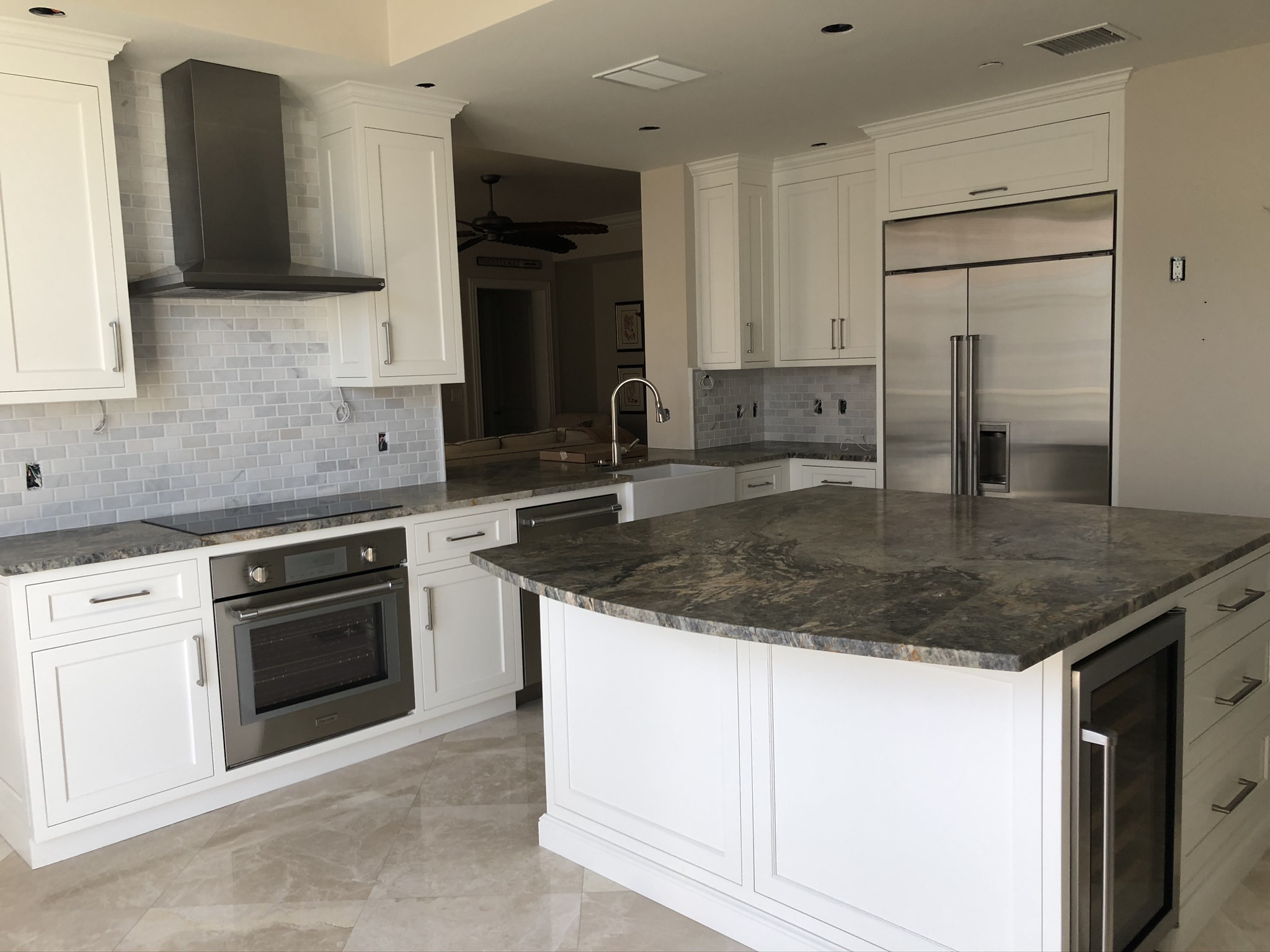 William Charles in Vero Beach, FL redesigned this kitchen with new custom cabinetry, backsplash and state of the are appliances.